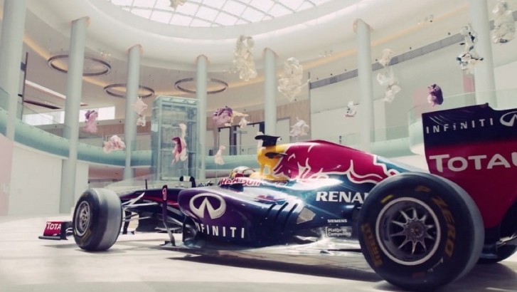 Carlos Sainz Jr. Driving an Infiniti car in Abu Dhabi’s Yas Mall