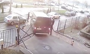 Watch Russian Police Make Fools of Themselves as They Chase a Car on Foot