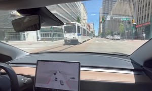 Watch Tesla Model 3 on FSD Beta Trying to Turn Directly in Front of a Train