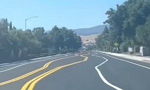 Watch Tesla FSD Navigate Road With Crooked Lane Markings Like a Pro!