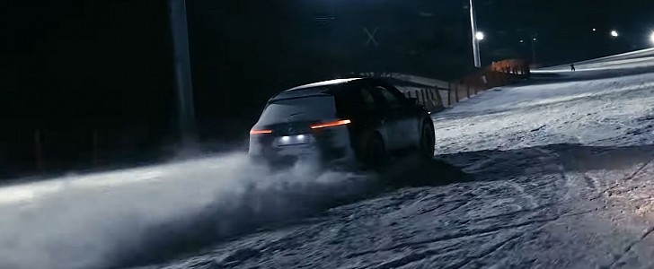 BMW iX climbs a ski slope