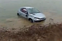 Watch Two Guys Crash a Peugeot 206 into a Lake