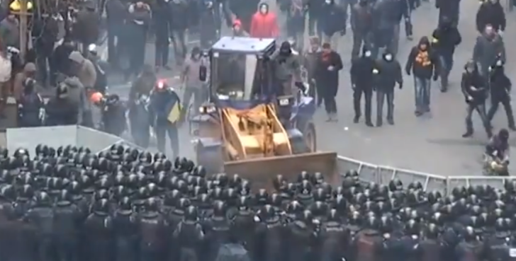 Ukrainian Protesters Use a Bulldozer Against Police