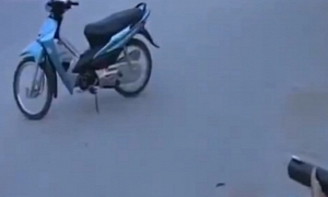 Watch Vietnamese Police Using Fishing Nets to Capture Runaway Bikers