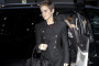 Emma Watson Arrives at Harry Potter Premiere in Escalade