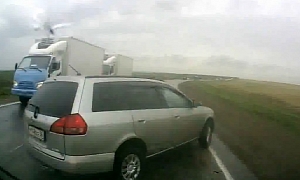 Wet Road Causes Overtaking Maneuver to Fail Miserably