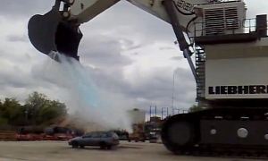 What a Dump: Mining Excavator 'Washes Car!