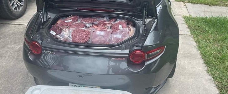 Mazda Miata MX-5 with Meat in trunk
