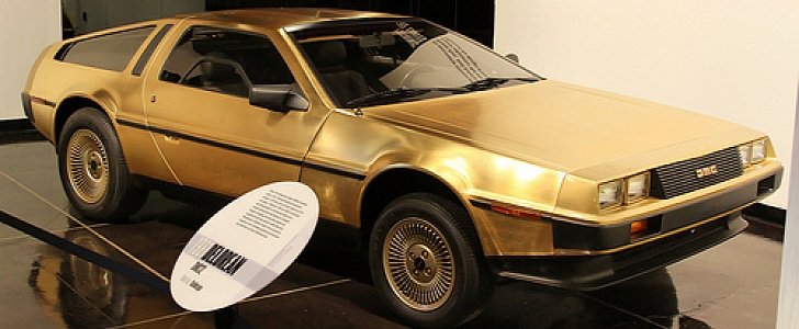 One of the golden DeLorean cars is on display at the Petersen Museum