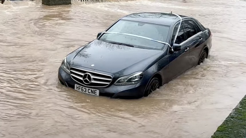 Mercedes-Benz E-Class stuck in water