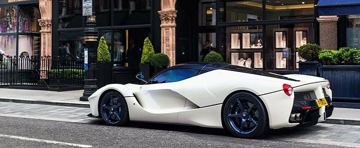 White LaFerrari with custom-colored wheels and window tint