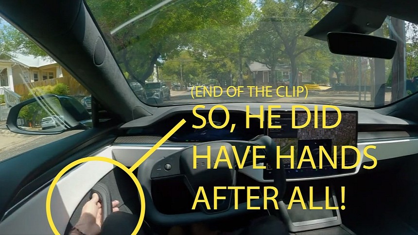Proof the Tesla driver has hands (well, at least one)
