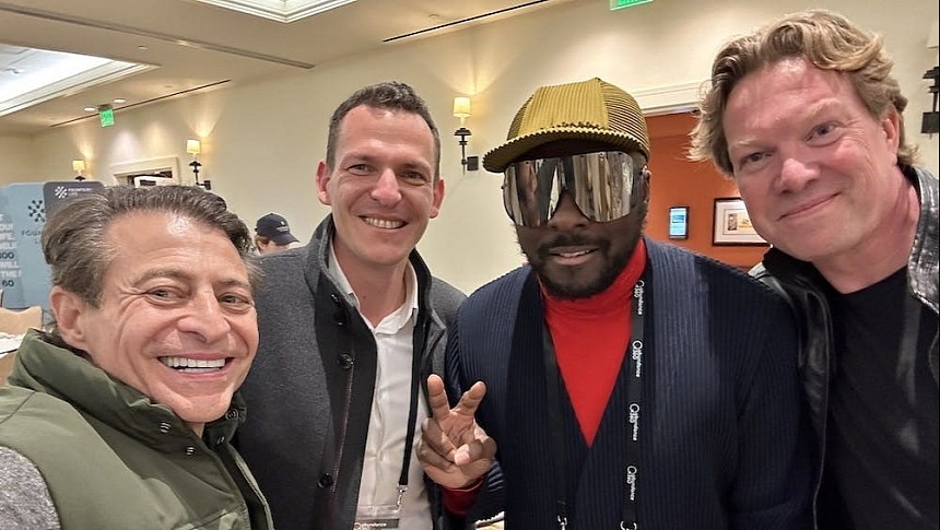 will.i.am and Tomasz Patan together with advisors Peter H. Diamandis and Rikard Steiber