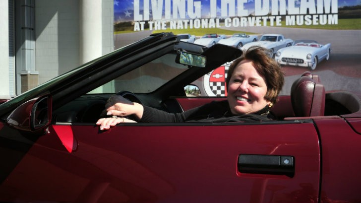 Lynda at the wheel of her 40th Anniversary drop-top Corvette