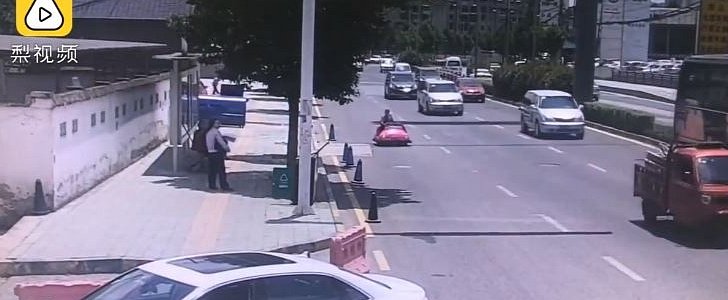 Woman Drives Pink Bumper Car on Busy Street, Is Unpredictably Pulled Over