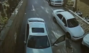 Woman Forgets Parking Brake on Sloped Surface - Gets Face-full of E-Class
