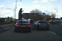 Woman Gets Piggyback Ride on Top of BMW 3 Series Coupe