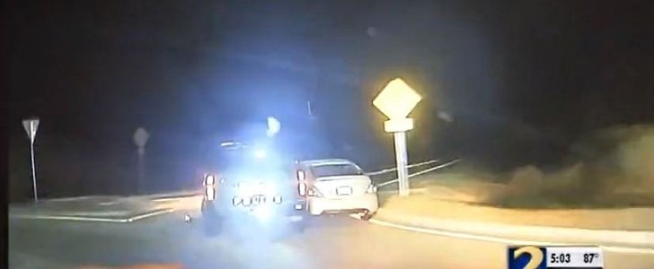 Police car tries to force female driver to pull over during intense high speed chase