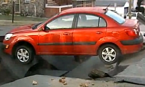 Woman in Kia Rio Trapped by Sinkhole in New Hampshire