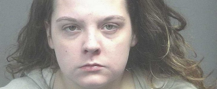 Woman arrested for drunk driving exits car chugging beer