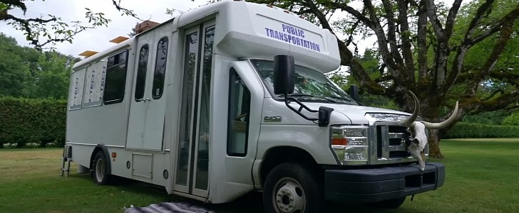 This 2016 Ford E-450 shuttle bus is both cat and human paradise on wheels