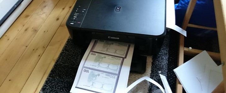 Home printer with fake money in Germany, after woman tries to buy car with fake euros