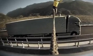 Woman Walks a Rope Between Two Rolling Volvo Trucks in New Ad