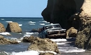 Wood-Carrying Ford Truck Emerges From the Ocean Like a True Rock Crawling Boss