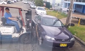 Workers in Sydney Illegally Move a Parked Car with a Forklift