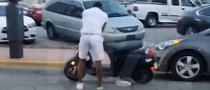 World Boxing Champion Adrien Broner Is Really Bad at Riding a Scooter