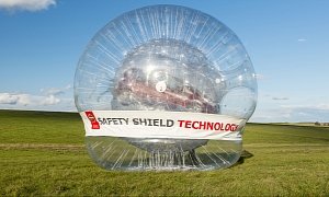 World's Biggest Zorb Used to Roll Nissan Car Down Hill <span>· Video</span>