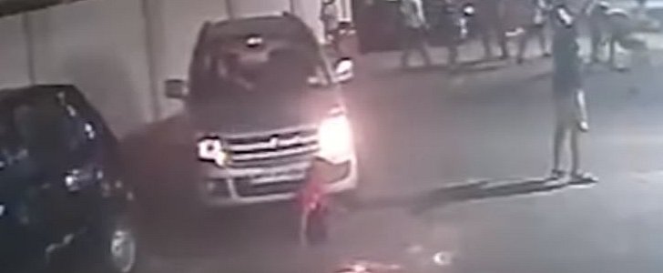 Female driver runs kid over on deserted street in India, keeps going