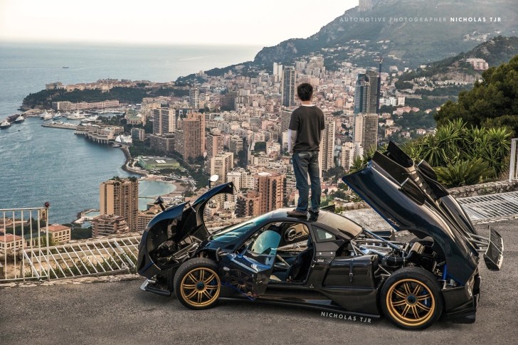 Owner standing on top of Pagani Zonda 