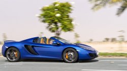 2013 MCLAREN MP4-12C Spider driving with top down