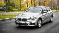 2015 BMW 2 Series Active Tourer front 3/4 in traffic