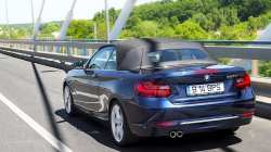 2015 BMW 220d Convertible driving with top on