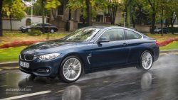 BMW 4 Series driving in rain