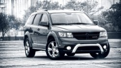 2015 Dodge Journey front three quarters view black and white