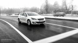 2015 PEUGEOT 308 driving in rainy conditions